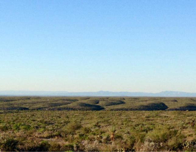 Another blue sky day in the cold morning air as we pedal along the expansive wide open range.