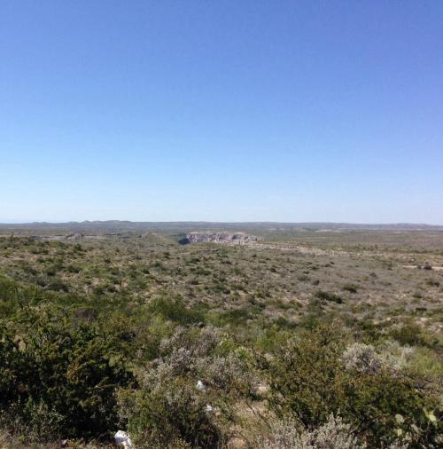 This was taken from a scenic overlook before we crossed the Pecos River and officially left west Texas behind. The Rio Grande and Mexico are out there in the distance. We took a break every chance we could as the day dragged on.