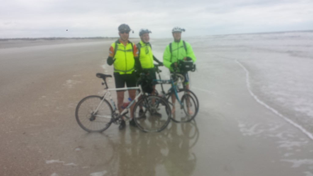 The brothers dipping our bike tires into the Atlantic Ocean at St. Augustine Beach.